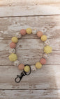 Yellow poppy wristlet