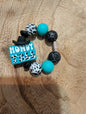 Blue howdy y'all with black cup charm